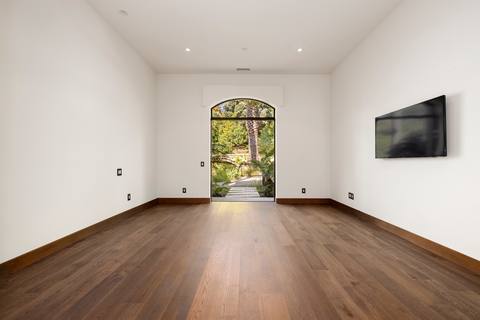 Bedroom with arched garden door