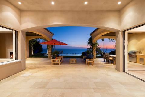 The covered terrace at dusk